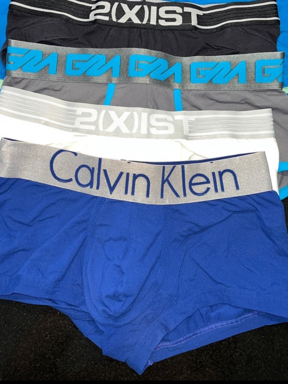 4pack. Black, Grey/Blue, Blue, Royal Blue, White with Logo Waistband.Size MEDIUM